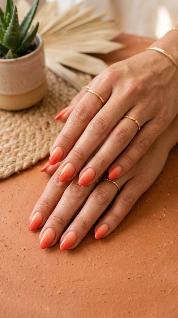 25 Stunning Short Almond Nail Ideas for 2026 to Elevate Your Style 24 Hands with coral 202604242307