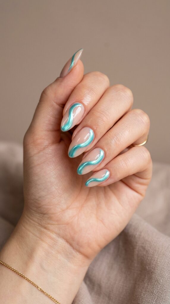 20 July Almond Nail Ideas That Hit Every Summer Trend Ideas to Elevate Your Style 19 Almond nails aqua chrome accents 202605041056