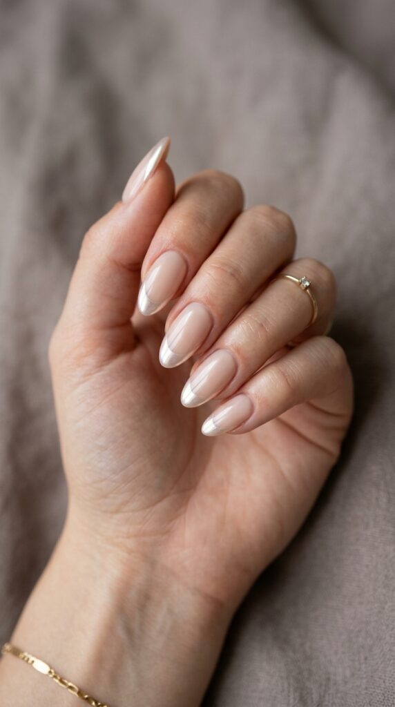 20 July Almond Nail Ideas That Hit Every Summer Trend Ideas to Elevate Your Style 14 Almond nails pearl chrome tips 202605041053