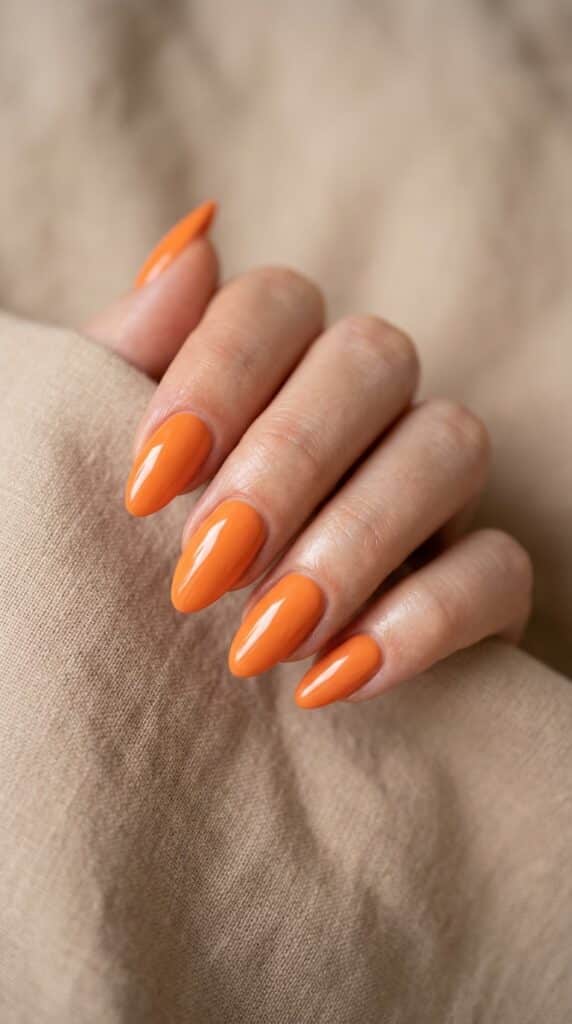 20 July Almond Nail Ideas That Hit Every Summer Trend Ideas to Elevate Your Style 20 Almond nails vibrant tangerine p… 202605041057