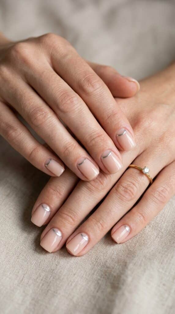 25 Chrome Nail Ideas to Elevate Your Style 24 Feminine hands with acrylic nails 202605031254