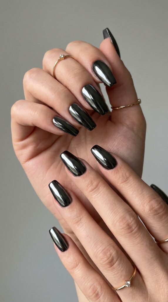 25 Chrome Nail Ideas to Elevate Your Style 6 Feminine hands with black chrome… 202605031240