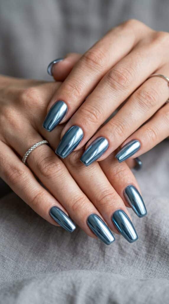 25 Chrome Nail Ideas to Elevate Your Style 23 Feminine hands with blue nails 202605031253