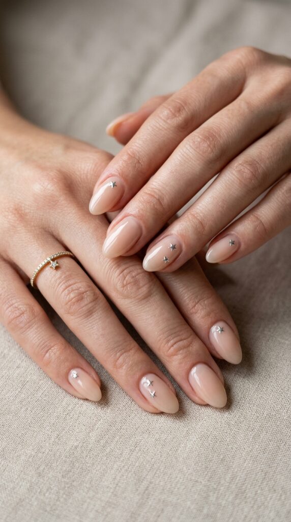 25 Chrome Nail Ideas to Elevate Your Style 17 Feminine hands with chrome star 202605031248
