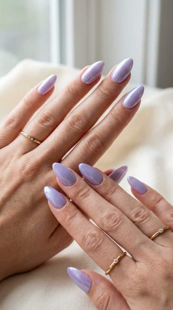 25 Chrome Nail Ideas to Elevate Your Style 7 Feminine hands with lavender nails 202605031240