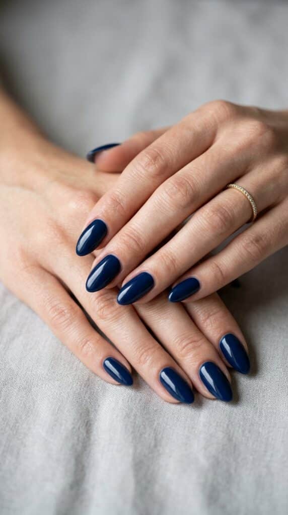 17 Stunning Nail Ideas to Try This Season 17 Feminine hands with navy nails 202605041818