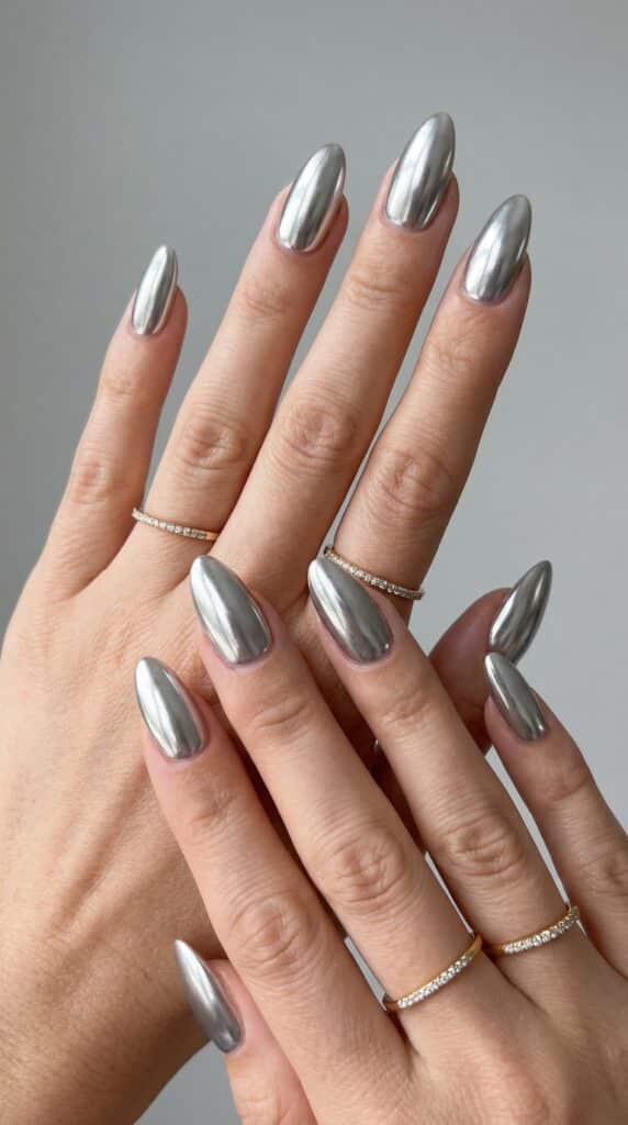 25 Chrome Nail Ideas to Elevate Your Style 2 Feminine hands with silver nails 202605031237