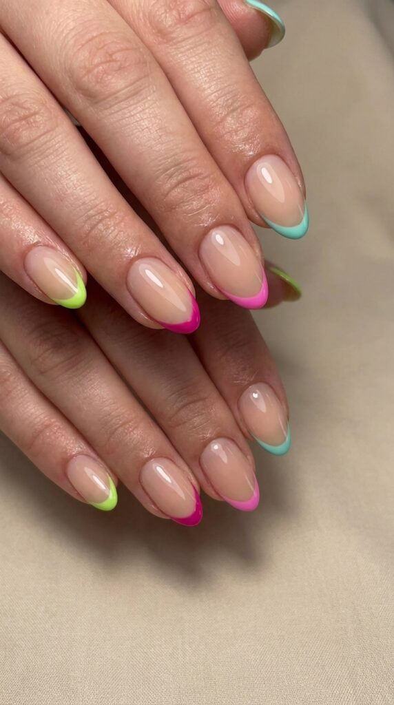 20 July Almond Nail Ideas That Hit Every Summer Trend Ideas to Elevate Your Style 6 Two feminine hands acrylic nails 202605041047