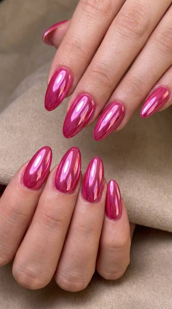 20 July Almond Nail Ideas That Hit Every Summer Trend Ideas to Elevate Your Style 11 Two feminine hands hot pink 202605041049