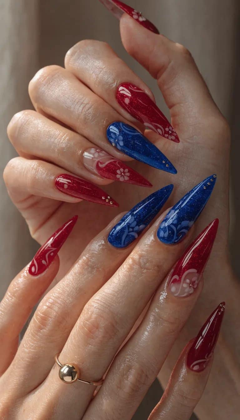 20 Stunning Red, White, and Blue Nail Art Designs for Patriotic Celebrations 2 Nails painted in red, white, and blue with floral designs and stars.
