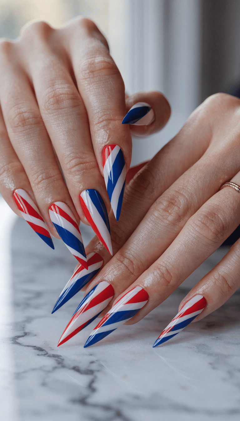 20 Stunning Red, White, and Blue Nail Art Designs for Patriotic Celebrations 16 Close-up of beautifully designed geometric red, white, and blue nails.