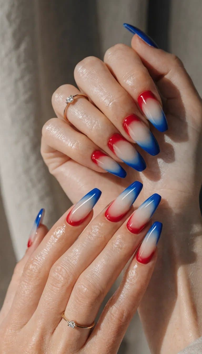 Elegant ombre nails in red, white, and blue for 4th of July