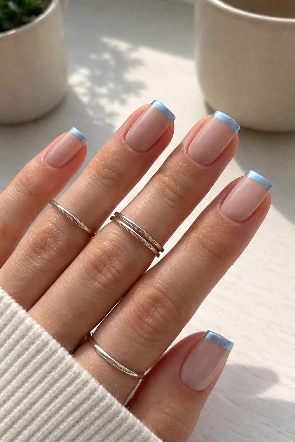 17 Chrome Baby Blue French Tip Nail Ideas to Screenshot for Your Next Winter Manicure 34 Short Chrome Baby Blue French Tips with Minimalist Ring Stacks