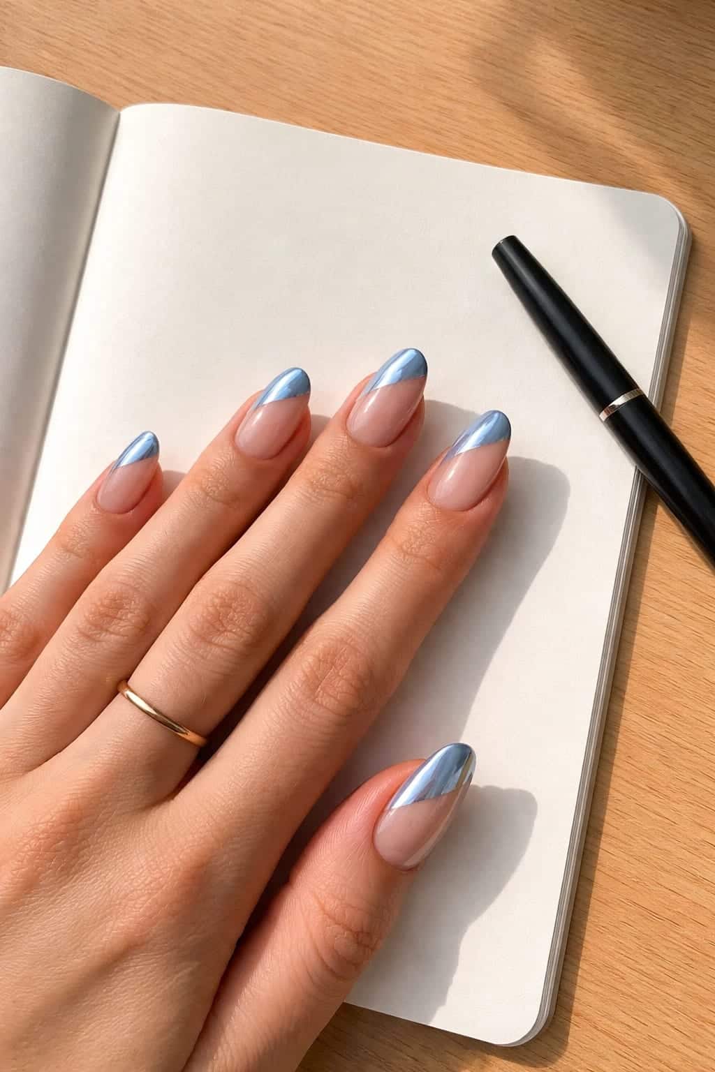 17 Chrome Baby Blue French Tip Nail Ideas to Screenshot for Your Next Winter Manicure 24 Minimalist Diagonal Chrome Baby Blue French for Everyday Wear